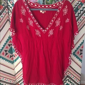 Embroidered red and white tunic